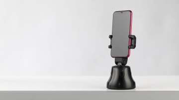 Tracking phone holder