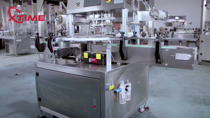 Single head rotary film sealing machine for PET cans