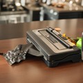 Intelligent Desktop Vacuum Packaging Sealer with Automatic Lift, Pressure Adjustment, and Foot Pedal Operation1