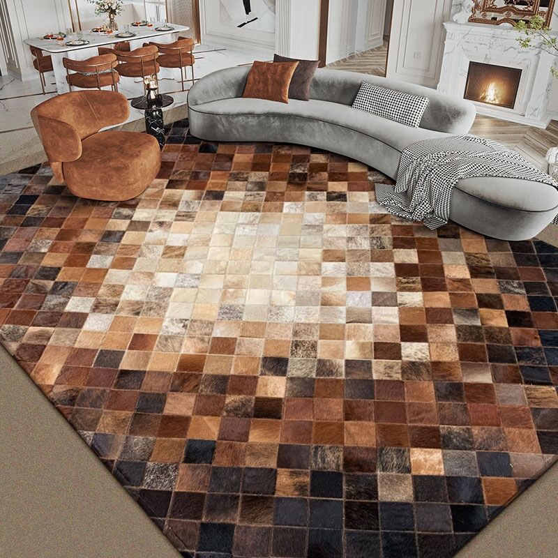 brown cowhide patchwork living room area rug