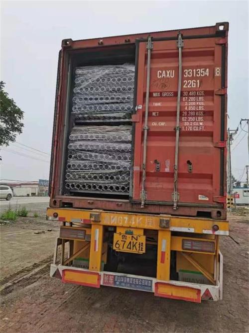 Two containers of ground screw pile packing for shipment