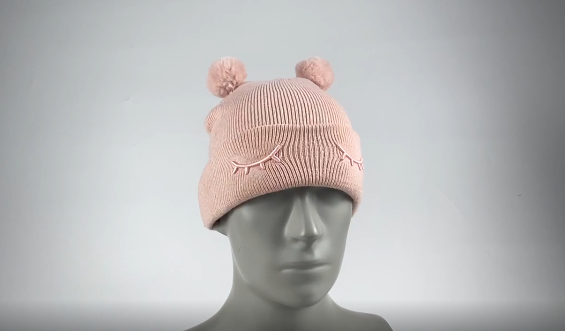 Knit beanie hat with two pom