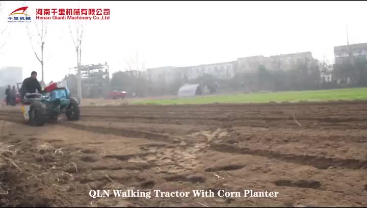 walking tractor with corn planter.mp4