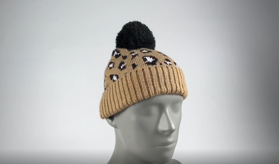 knitted jacquard winter hat with pom