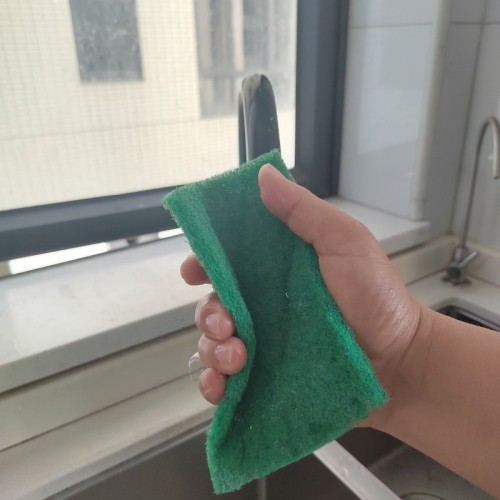 How to use scouring pads to effectively clean various surfaces in your home?