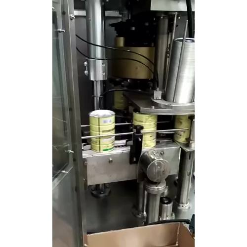 Machine de sertissage de boîtes d'azote sous vide