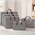 Foldable Non-Woven Waterproof Quilt Organizer for Travel and Luggage1