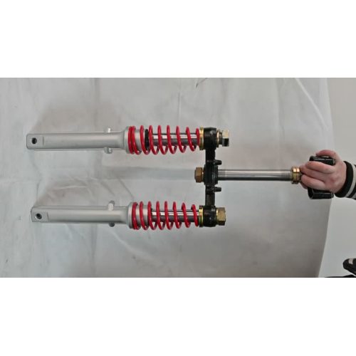 Absorvedor de choque de mola de três rodas