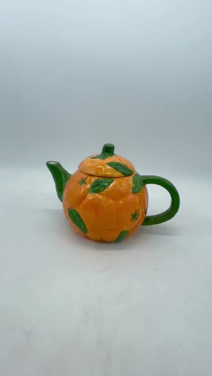 Tetera naranja serie Fruit