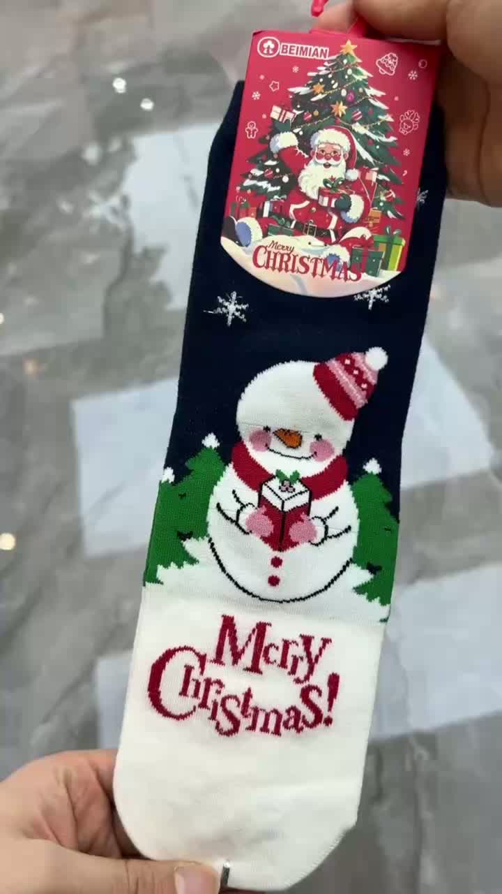 Жаночыя калядныя шкарпэткі сярэдняга крыніча