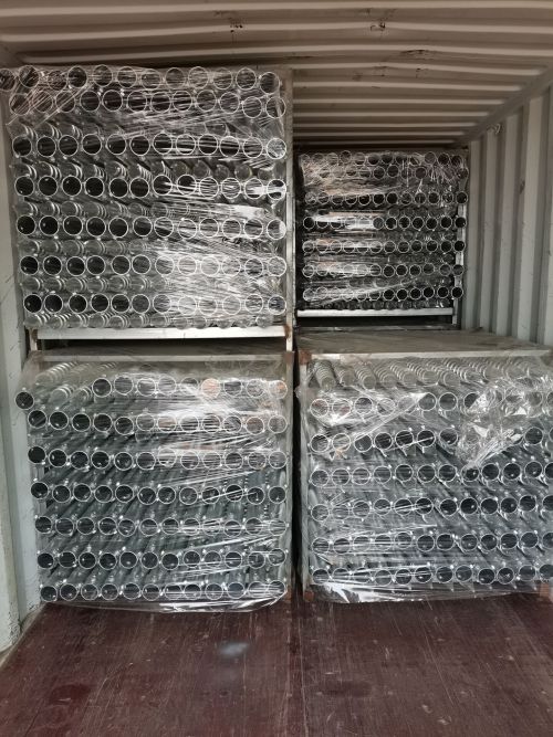 loading ground screw anchors into containers 