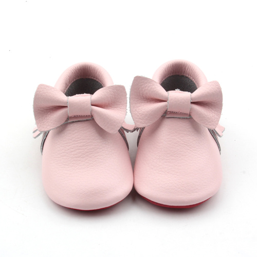 Scarpe con nappine per bambini 