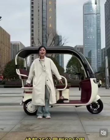 Three color electric tricycle capable of carrying passengers