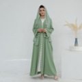 مجموعه عید گلدوزی اپن ست عبایی با حجاب ژاکت کش باف پشمی مسلمان دبی روپوش ساده آستین بلند1