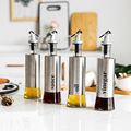 500ml Wholesale Hot sale Kitchen Bottle European Creative Glass Oil Pot Stainless Steel Press Type Oil Pot1