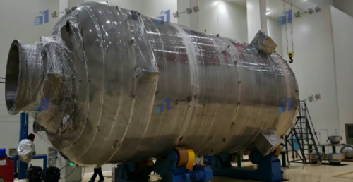 Delivery of Polyoxymethylene Zirconium-Titanium-Steel Clad Plate Reactor