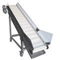 White food grade inclined belt conveyor supplies food industry.1