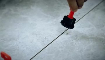 Use of tile leveler
