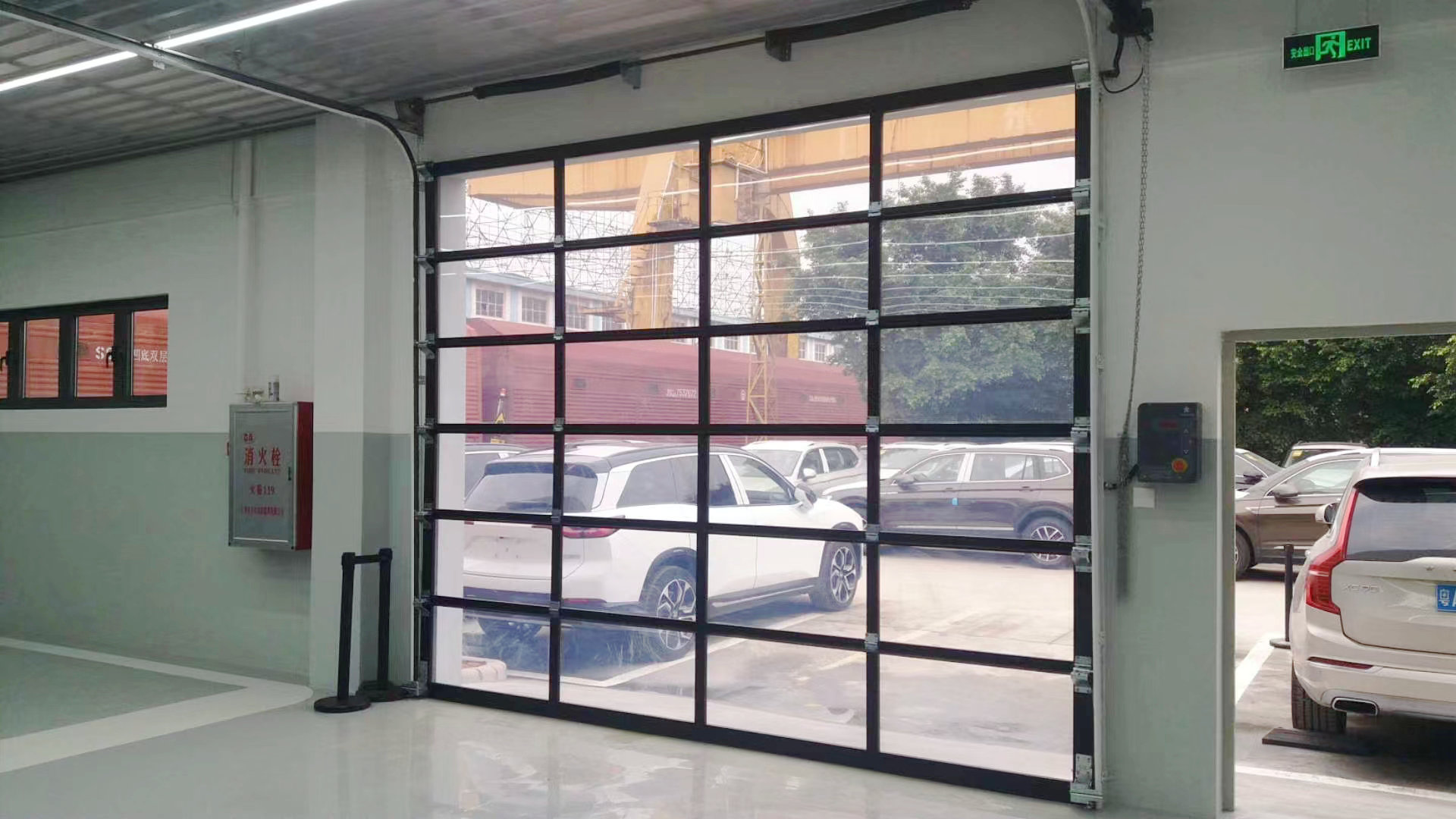 Glass sectional garage door