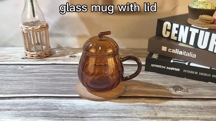 pumpkin shaped amber colored glass mug with lid