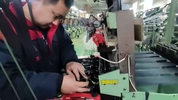 Workers operate the machines