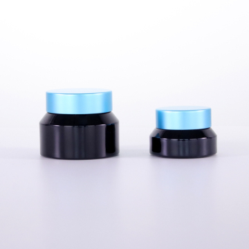 Blue sprayed black oblique shoulder cream jar