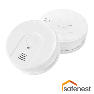What is the difference between a smoke detector and a heat detector?