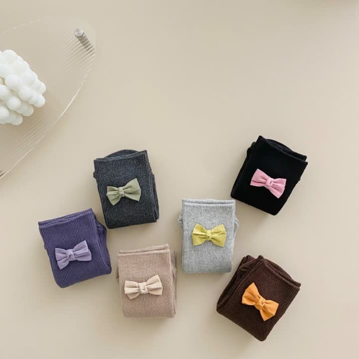 Calcetines de media pantorrilla de color liso con lazo para niña