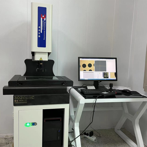 What is a fully automatic image measuring instrument?