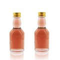 High-Quality 50ml Mini Glass Bottle Clear Wine Liquor Alcohol Spirits Bottle Sales Empty Round Glass Bottle1