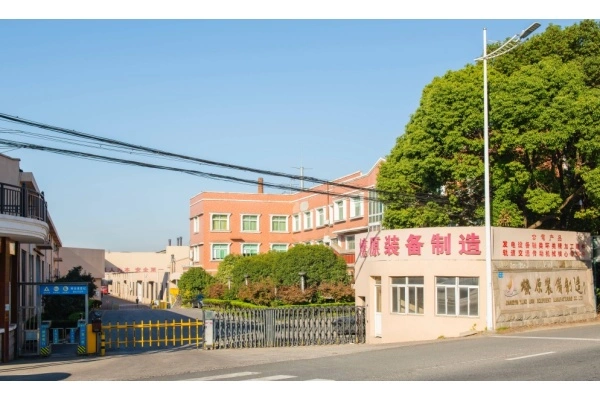 Jiangyin Liaoyuan New Energy factory exterior showing metal forging machinery facilities
