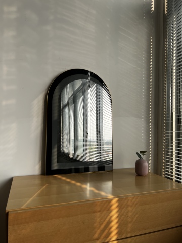 Semi-ellipse framed mirror