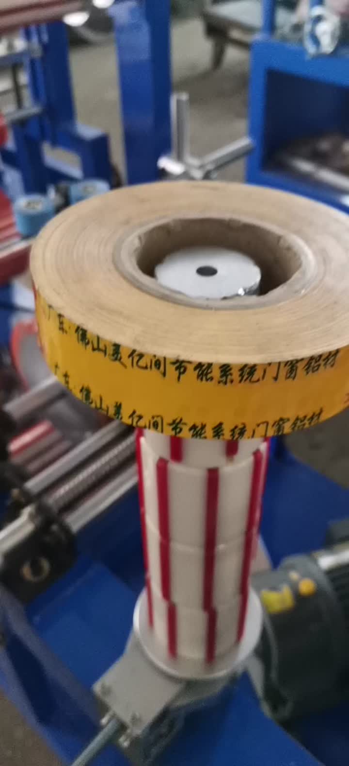 dispositif de changement de machine à plastifier le film