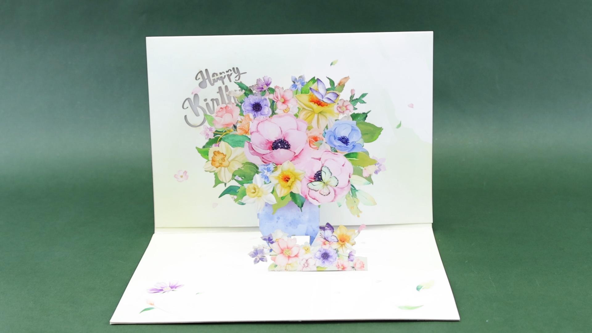 Biglietto pop-up di compleanno con bouquet di fiori 3D illuminato con musica