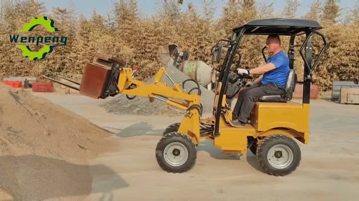 Small electric wheel loader with forks