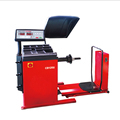 Self-Calibrating Computer Special Tire Changer and Wheel Balancer1