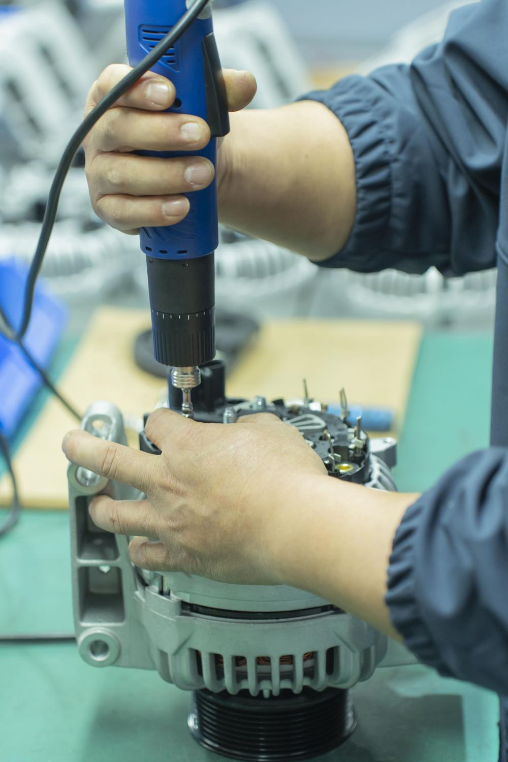 Assembling a Generator with Precision Tools