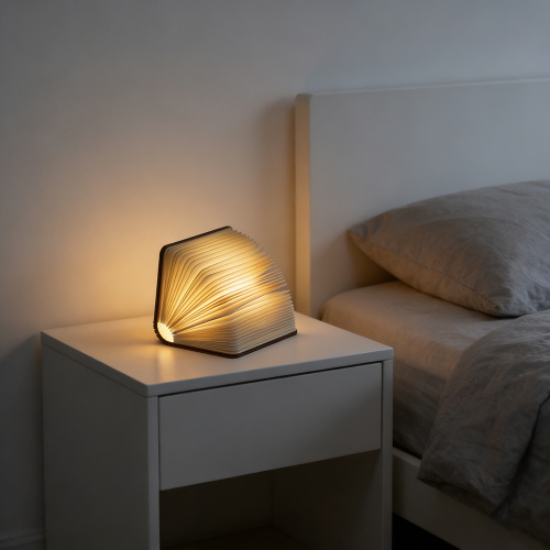 Luz atmosférica em forma de livro criativo