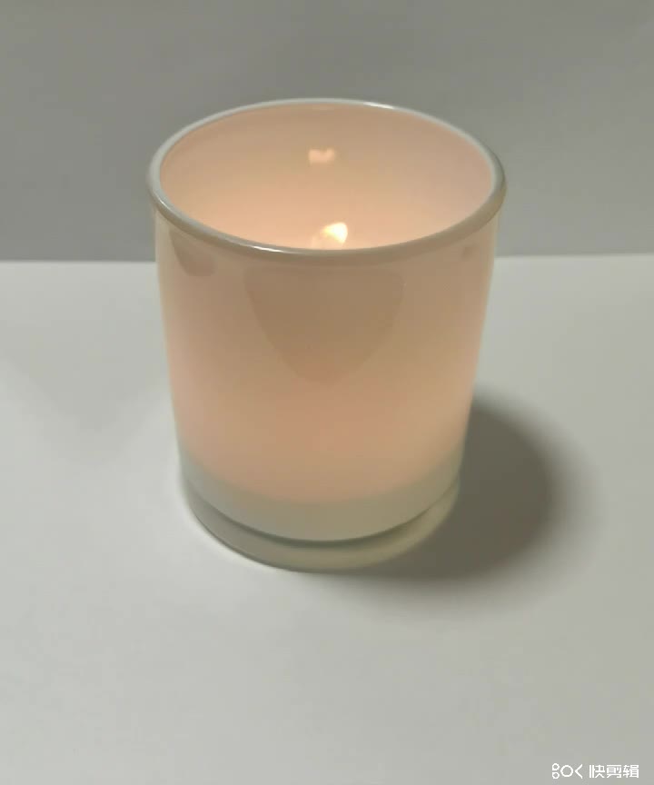 white color jar candle