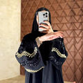 روپوش مسلمان پولک دار مشکی دبی عبای دوزی عربی با حجاب کت روپوش مد روز فروش عمده لباس اسلامی1