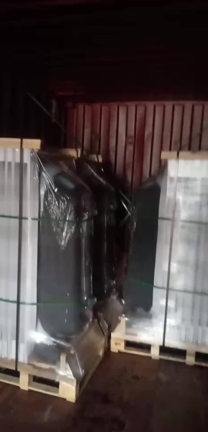 loading cast iron bathtub into the container
