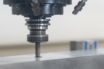 What is the difference between CNC milling machine and machining center?