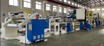 extrusion laminating machine is running