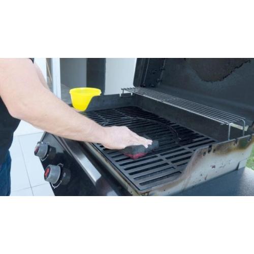 How do you clean the grill's cooking grate