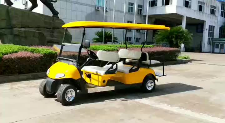 Still video of a yellow 6-seater electric golf cart.mp4