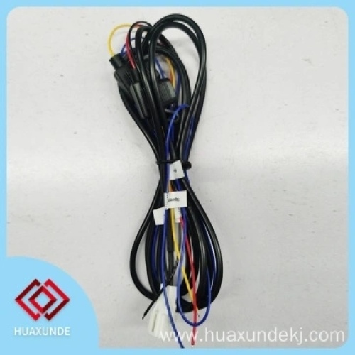 What products typically require an electronic wiring harness?