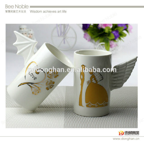 promotional ceramic angels cup with wing shape