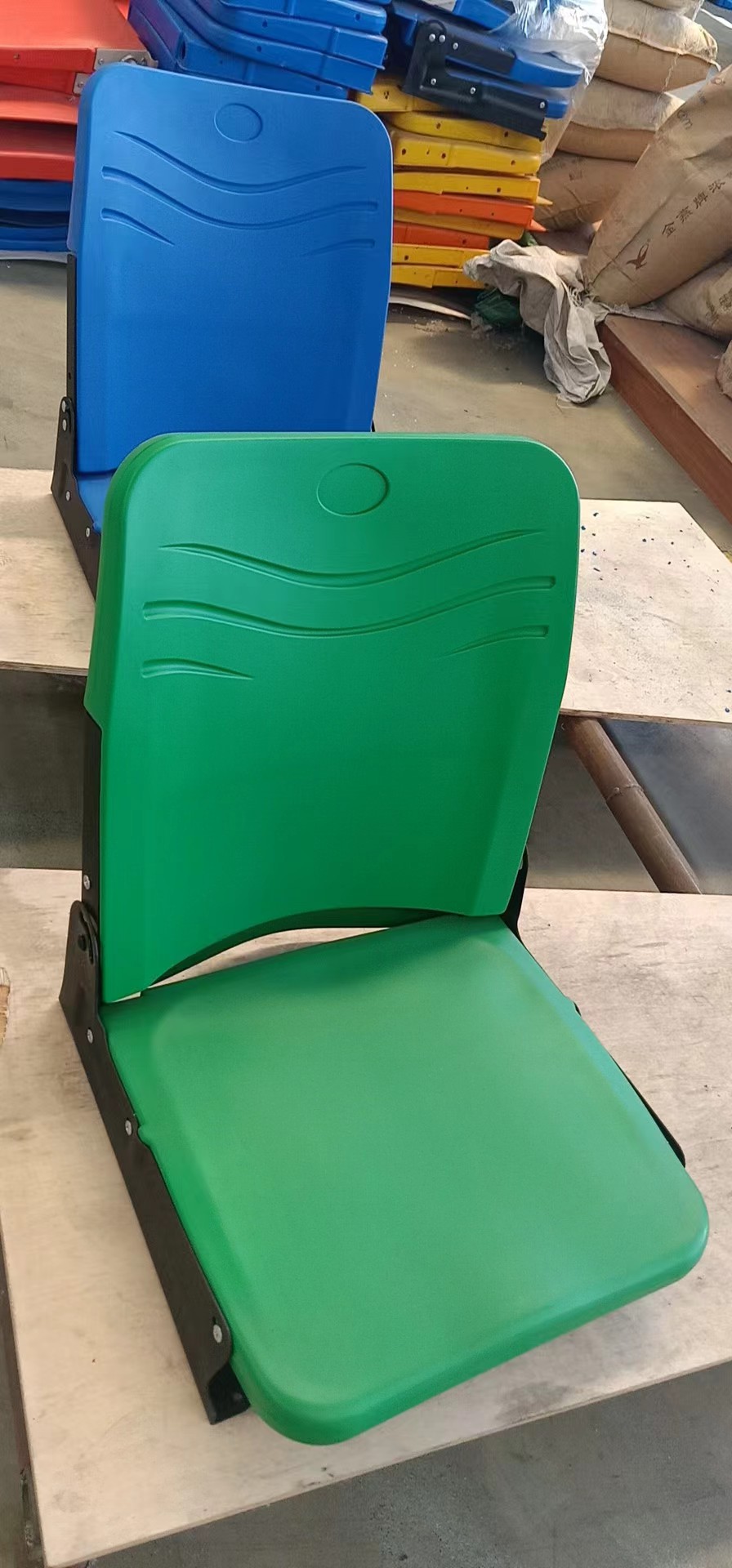 Front mounted folding seat