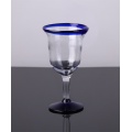 blue color edge drinking glass goblet cup and pitcher