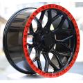 Ruedas completamente pintadas en negro brillante de 20 pulgadas con aro rojo y 24 tuercas en negro mate